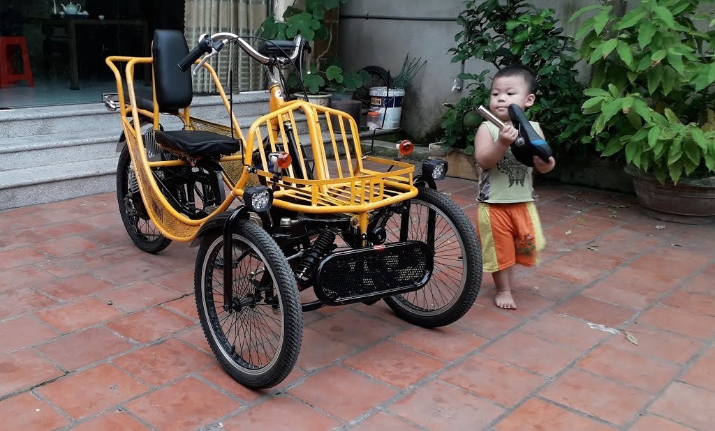 Chiếc xe đạp điện 3 bánh tự chế của anh Dũng Chiếc xe đạp điện 3 bánh tự chế của anh Dũng